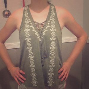 a green tank top